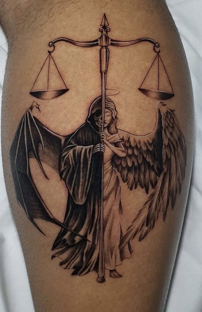 A black and grey tattoo of a hooded figure with one angel wing and one bat wing.